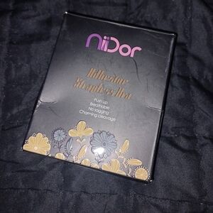 Adhesive strapless bra